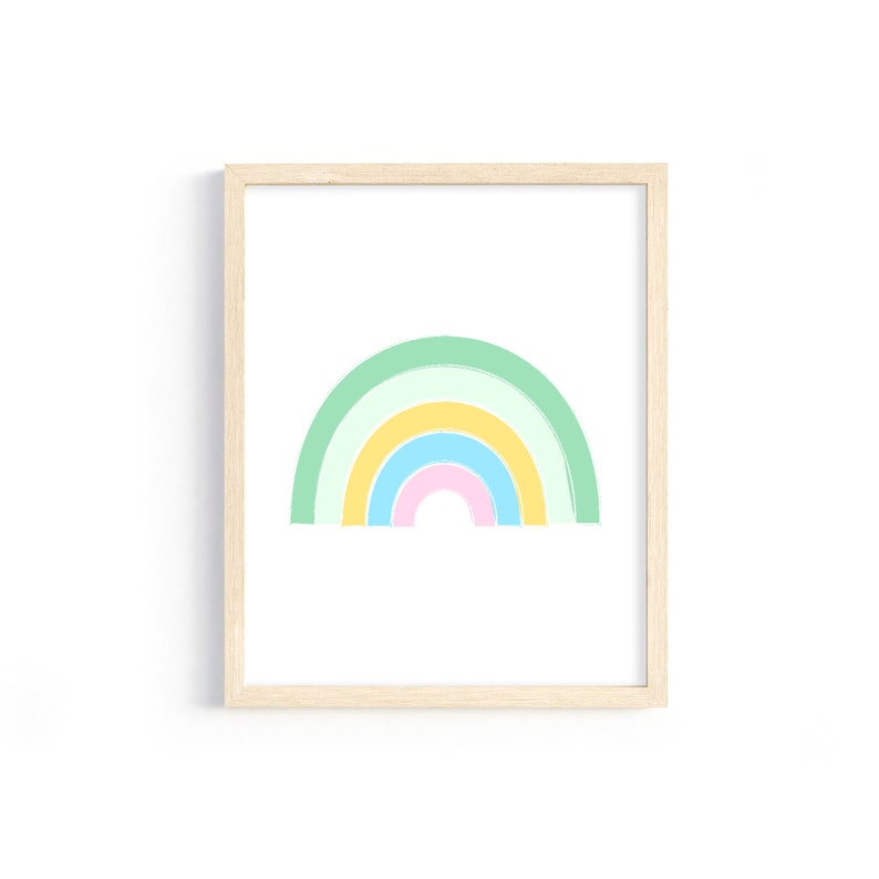 K&ouml;nnte beinhalten: Ein gerahmter Druck eines Regenbogens in Pastellfarben, darunter Gr&uuml;n, Gelb, Blau und Rosa.