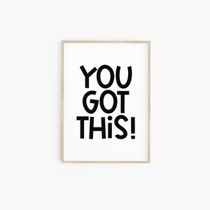 May include: A framed print with the text "YOU GOT THIS!" in black bold letters on a white background.