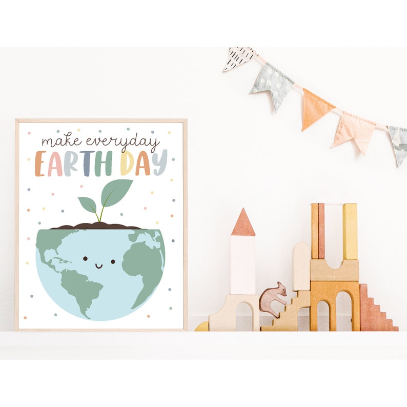 May include: A white poster with the text "make everyday EARTH DAY" in colorful letters. A cartoon earth with a smiling face is inside a pot with a green plant growing out of it. There are colorful dots scattered around the earth.