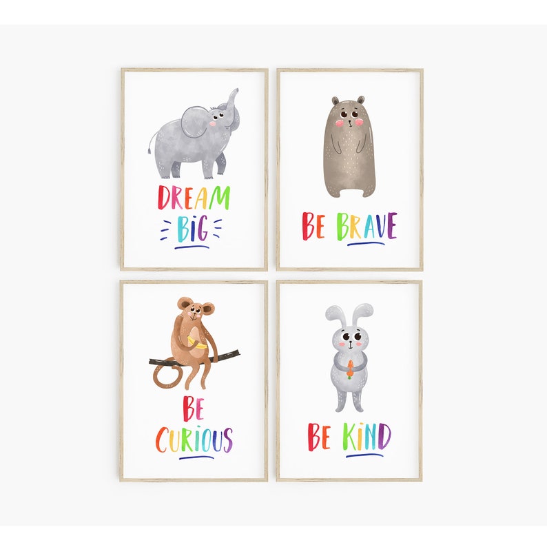 May include: Set of four printable posters featuring colorful illustrations of an elephant, bear, monkey, and rabbit. Each poster includes a motivational message: "Dream Big", "Be Brave", "Be Curious", and "Be Kind".