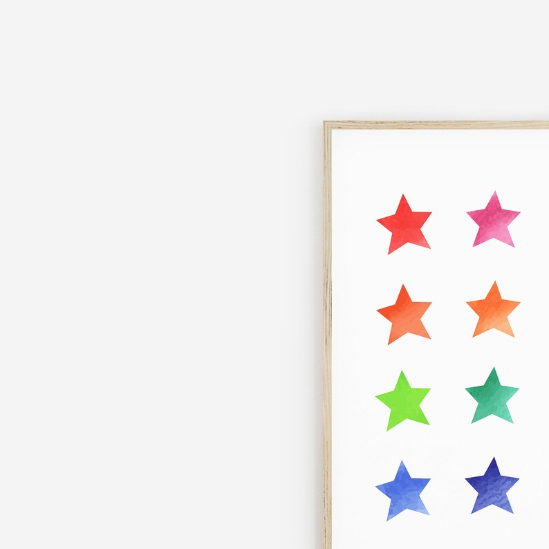 May include: A framed print with eight watercolor stars in a rainbow color gradient. The stars are arranged in two rows of four, with the top row starting with red and ending with pink, and the bottom row starting with orange and ending with blue.