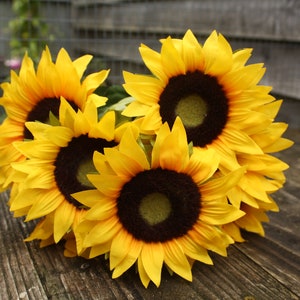 7 x Rich Yellow Silk Sunflowers 9cm & 11cm heads with foliage on wired stems