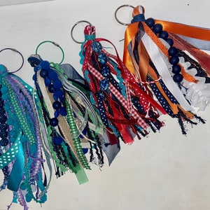 Charms para bolsos con cinta