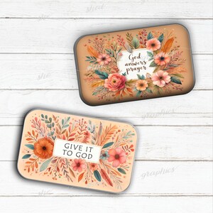 May include: Two rectangular decorative tins with floral designs. One tin features the text "God answers prayer" surrounded by flowers. The other tin has the text "Give it to God" with a floral arrangement. The tins have a tan background and a white border.