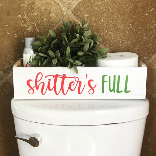 Shitters Full Toilet Paper Storage: Świąteczna dekoracja łazienki