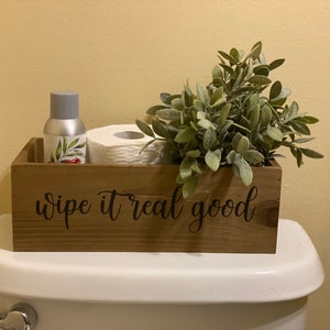 Wipe it real good. toilet paper holder. Toilet paper box. Toilet paper storage. Toilet box.