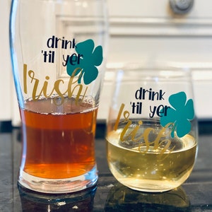 Drink till yer Irish pilsner glass. St. Patrick’s day stemless wine glass. St. Patty’s Day drink ware. Green and gold bar ware. St. Patrick.