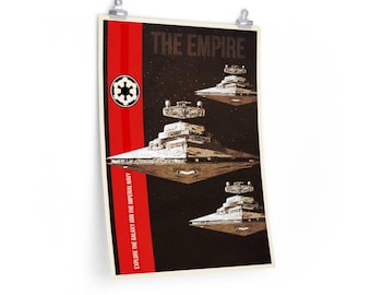 May include: A vintage-style poster with a red and black color scheme featuring the Star Wars Imperial insignia and the text "THE EMPIRE". The poster depicts three Imperial Star Destroyers flying in formation against a dark background of stars. The text "EXPLORE THE GALAXY. JOIN THE IMPERIAL NAVY." is printed on the side of the poster.