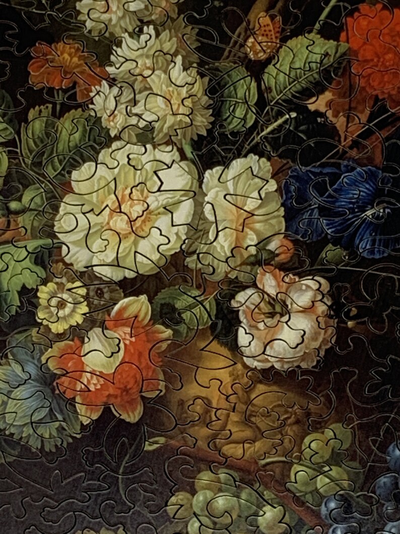 May include: A vintage still life painting featuring a vase filled with a variety of flowers, including white peonies, red carnations, and blue blossoms. The flowers are arranged in a loose, natural style, and the painting is done in a realistic style.