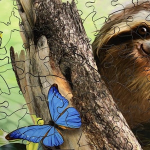 May include: A jigsaw puzzle featuring a sloth and a blue butterfly. The sloth is brown and tan, with a focused gaze. The butterfly has bright blue wings with black edges. The puzzle pieces are visible, creating a textured effect.