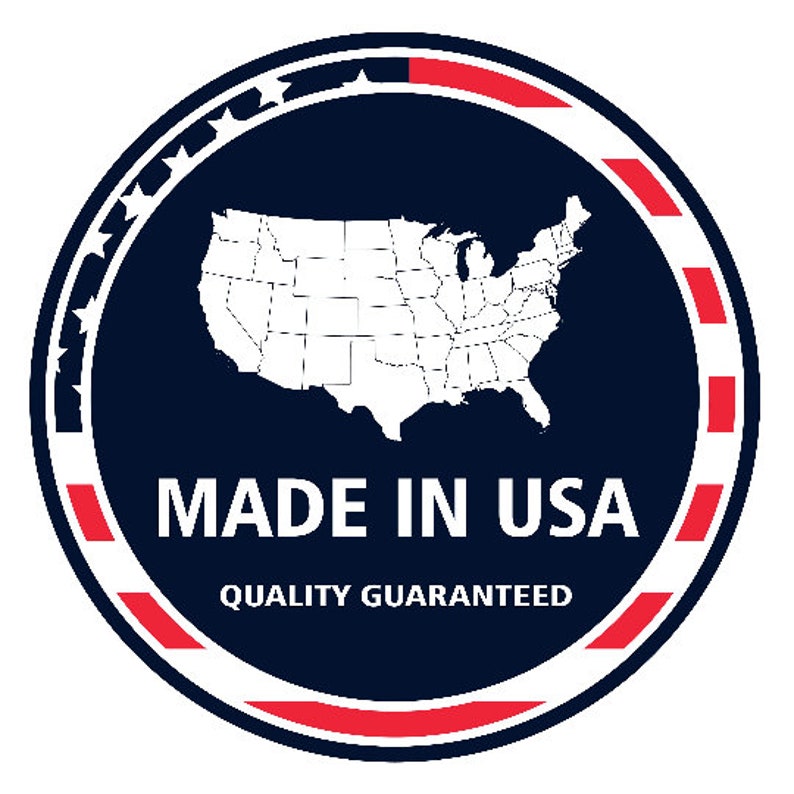 May include: A circular emblem with a navy blue background, featuring a white outline of the United States map. The text "MADE IN USA" is in white, with "QUALITY GUARANTEED" below. The border is red and white.