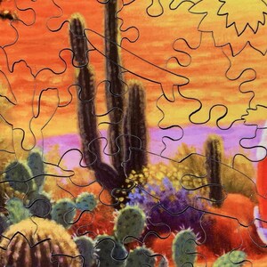 May include: A jigsaw puzzle depicting a desert landscape with cacti, a red vehicle, and a vibrant sunset. The puzzle pieces interlock to form a colorful scene with shades of orange, purple, and green, evoking a sense of adventure.