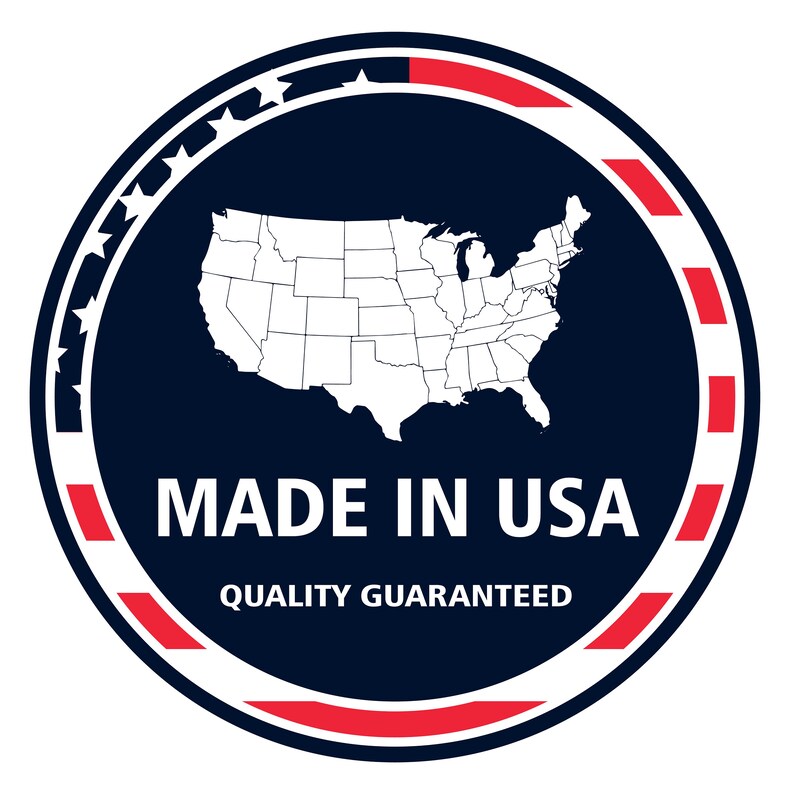 May include: A circular emblem with a navy blue background, featuring a white outline of the United States map. The text "MADE IN USA" is in white, with "QUALITY GUARANTEED" below. The border has red and white stripes and stars.
