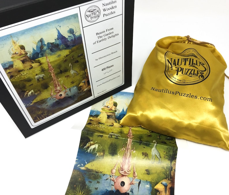 May include: A 400-piece wooden jigsaw puzzle of Hieronymus Bosch's 'The Garden of Earthly Delights' in a black box with a gold satin bag. The box has the title of the puzzle and the artist's name on it. The bag has the Nautilus Puzzles logo and website address.