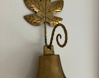 Handmade vintage brass leaf with hanging bell. Swedish vintage 1960s.