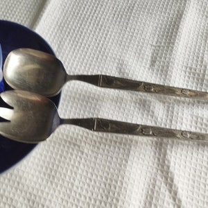 Stainless steel spoon and fork serving set Scandinavian vintage 1980s.