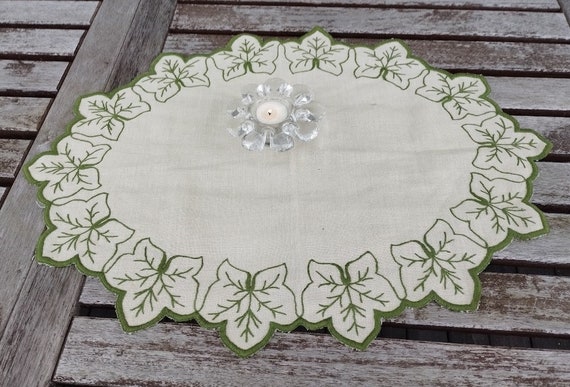 Grey oval tablecloth deals