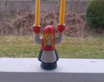 Christmas ceramic folk girl candelabra for 2 candles. Swedish vintage 1990s.
