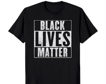 May include: Black t-shirt with a white graphic that says "Black Lives Matter" in a distressed font.