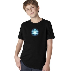 May include: A black t-shirt with a light blue glowing Iron Man arc reactor design on the front.