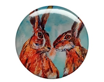 Flo & Mabel the hares round fridge magnet