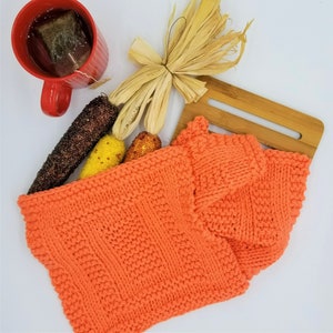 Samples of Spainhour Thanksgiving dishcloth knitting pattern knit with orange yarn