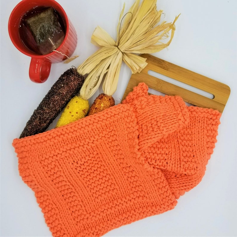 Samples of Spainhour Thanksgiving dishcloth knitting pattern knit with orange yarn