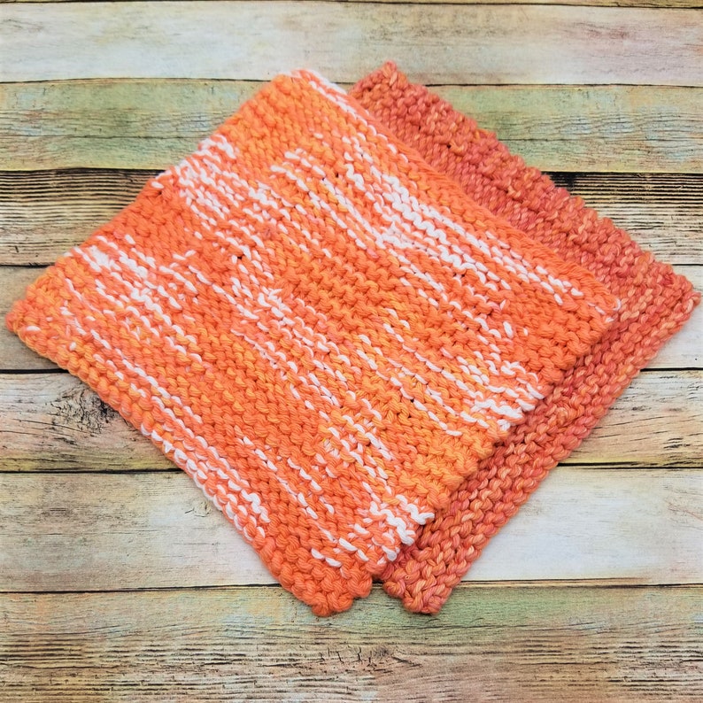 Samples of Spainhour Thanksgiving dishcloth knitting pattern knit with orange yarn