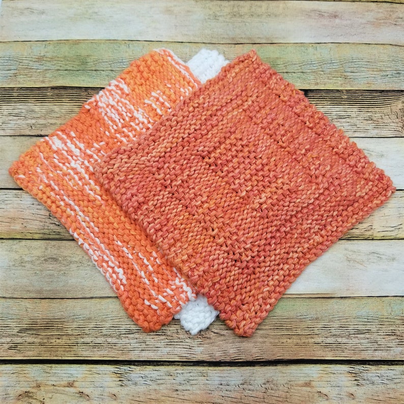 Samples of Spainhour Thanksgiving dishcloth knitting pattern knit with orange yarn