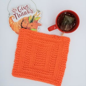 Sample of Spainhour Thanksgiving dishcloth knitting pattern knit with orange yarn