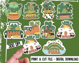 Puede incluir: Conjunto de diez pegatinas imprimibles para el Día de San Patricio con tréboles, arcoíris y amuletos de la suerte. Las pegatinas incluyen frases como "Feeling Lucky", "Happy Go Lucky", "Kiss Me I'm Irish", "Shamrock Curie", "Loads of Luck", "Lucky as Can Be", "Lucky & Loved" y "Lucky Vibes".