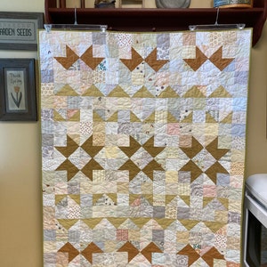 Modern Patchwork Quilt; throw size quilt in muted neutral tones; Low volume scrappy background; Stars that shimmer