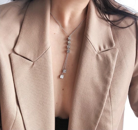 Dior silver crystal parish style charm necklace, D