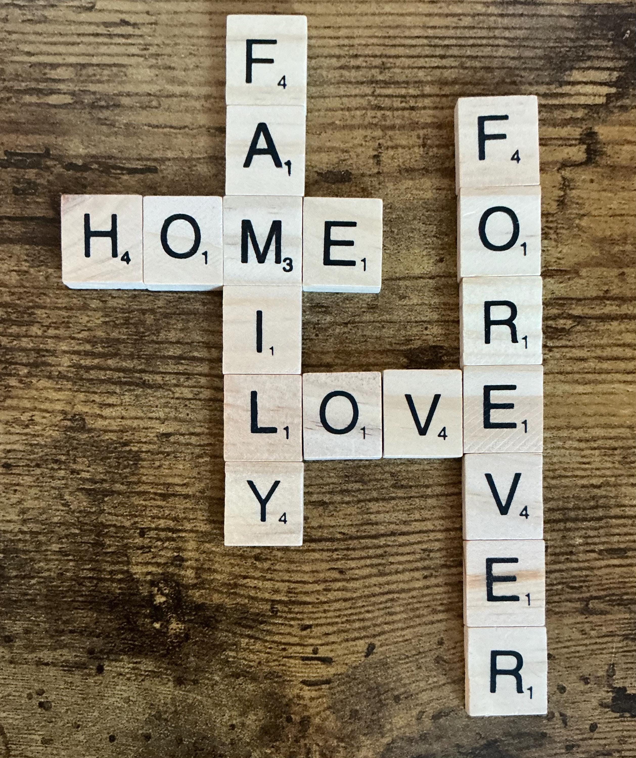 Wooden Scrabble type letter tiles