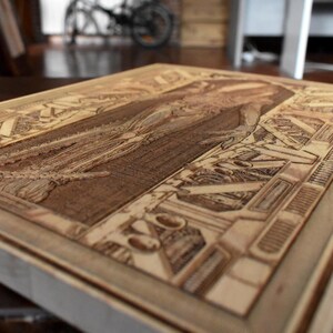 Space horror wood artwork featuring dark otherworldly monster engraving