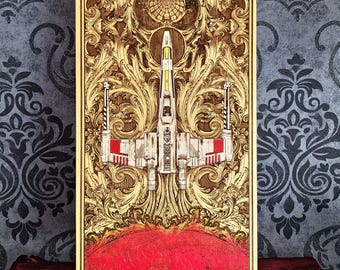 May include: A rectangular wooden wall art piece featuring a laser-engraved X-wing starfighter centered against an intricate, ornate gold-toned filigree background. The starfighter displays red and white accents, while a vibrant red planet sits below.