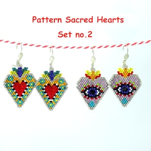 Peut inclure: Trois paires de boucles d'oreilles en forme de cœur, ornées de perles colorées et munies d'un crochet argenté. Les boucles d'oreilles sont étiquetées "Pattern Sacred Hearts Set no. 2".