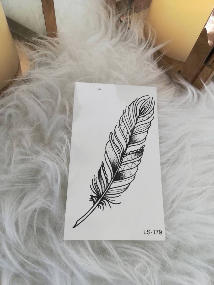 Feather tattoo by Natasha Hannascott | Photo 28225