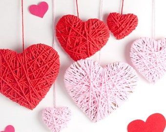 Valentines backdrop, heart template, yarn hearts, hearts backdrop, valentine backdrop ideas, yarn wrapped hearts, yarn heart craft