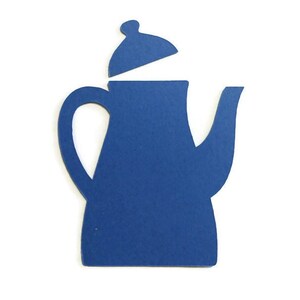 May include: A blue ceramic teapot with a lid. The lid is open and the teapot is sitting on a white background.