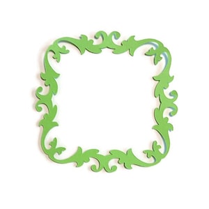 May include: A bright green, square-shaped decorative frame with an ornate, swirling design. The frame has a light blue backing and is set against a white background. The frame's design is reminiscent of classic scrollwork.