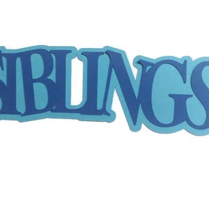 May include: Blue and light blue paper cutout of the word "SIBLINGS" in a stylized font.