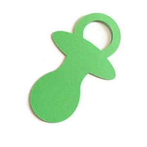 May include: A green paper cutout of a baby pacifier.