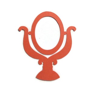 May include: A red, decorative tabletop mirror with a round frame and ornate base.
