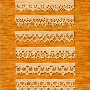 May include: A set of ten decorative laser cut patterns for crafting projects. The patterns are intricate and detailed, featuring a variety of floral and geometric designs. The patterns are shown on a wood background.