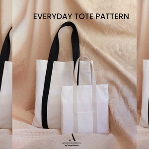 May include: Two white canvas tote bags with black handles. The larger bag has a black stripe down the side. The smaller bag has a black stripe across the bottom. The bags are on a light brown textured surface. The text "EVERYDAY TOTE PATTERN" is at the top of the image. The text "artistica patterns by Triinge Studio" is at the bottom of the image.