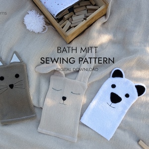 May include: Three bath mitt sewing patterns, a cat, a bunny, and a bear, on a beige textured background. The text reads "Bath Mitt Sewing Pattern, Digital Download".