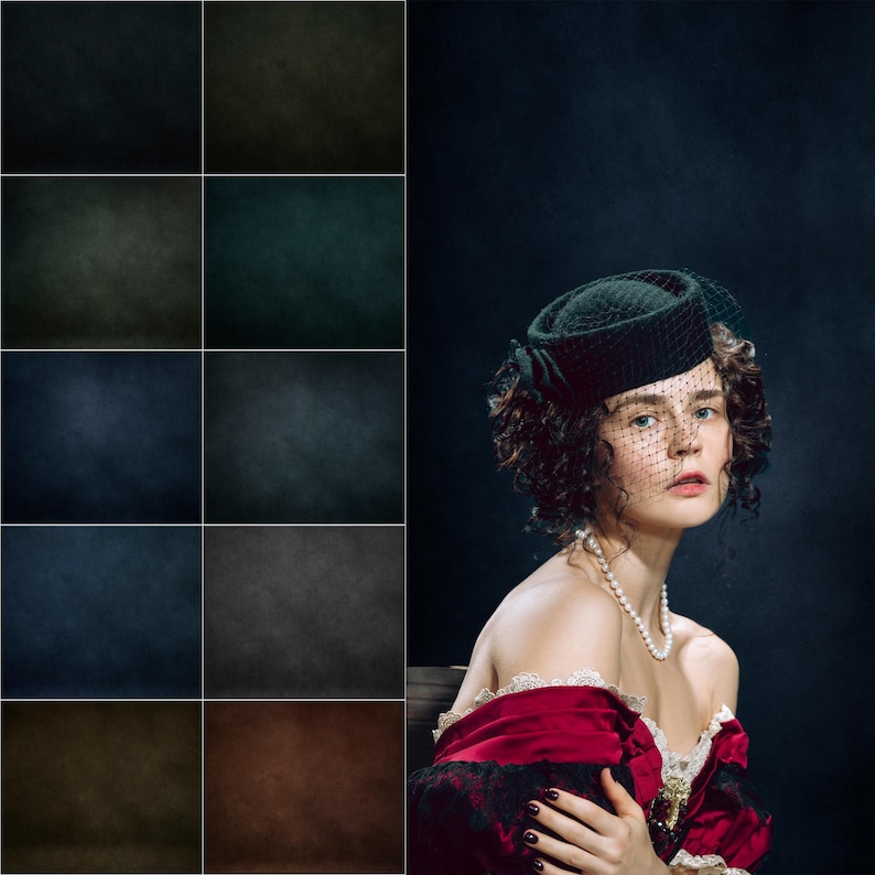May include: A woman with dark curly hair wears a black hat with a veil and a red dress with black lace trim. She is posing against a dark blue background.
