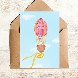 Osterkarte Hase auf Ballonfahrt Postkarte