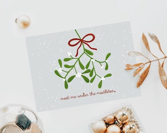Christmas card love with mistletoe and saying